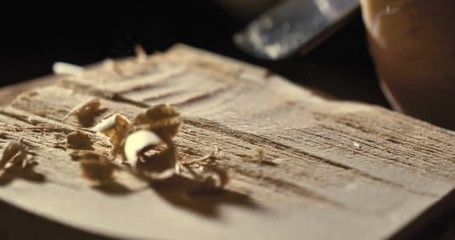 The professional violin master makes a violin with his own hands, uses a clean tree spruce, pine, glasses, planes, tunes strings. Concept: spiritual instrument, hand made, art, music, melody, sound.