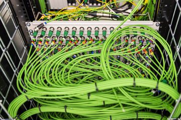 Severs computer in a rack at the large data center. Rack Mounted Servers. The image has a little...