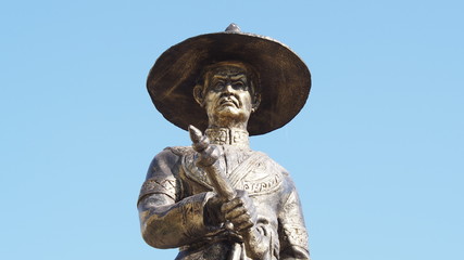 statue of King Taksin of Thonburi, The great king of Thailand isolated on blue sky background