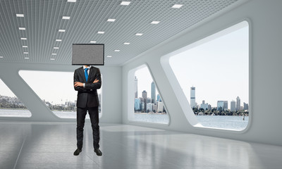 Fototapeta premium Businessman with TV instead of head.