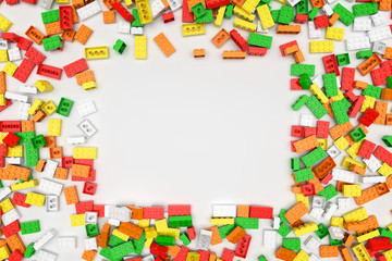 Fototapeta na wymiar Pile of colored toy bricks isolated on white background. 3D illustration