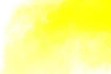 Fototapeta na wymiar abstract yellow dust explosion on white background. abstract yellow powder splatter on white background. Freeze motion of yellow powder splash.