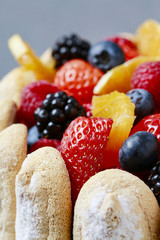 French charlotte cake with summer fruits - details