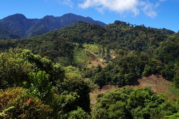 Fototapeta na wymiar Brignt day view over mountain landscape in Panama