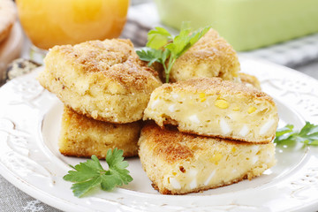 Traditional croquettes stuffed with eggs.