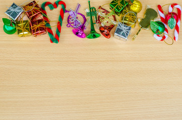 Christmas and new year decoration items with small elements. flat lay decoration on the wooden background. Top view.