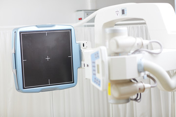 Screen of modern radiological equipment in hospital with nobody around