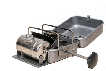 Portable tourist burner on a white background. Petrol Primus.