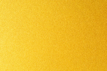 Details of golden texture background. Gold color paint wall. Luxury golden background and wallpaper. Gold foil or wrapping paper