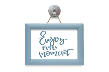 Enjoy every moment. Modern calligraphy. Motivational quote. Blue photo frame