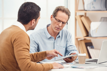 Fototapeta premium Two business men together in the office