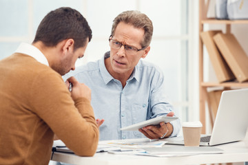 Fototapeta premium Two business men together in the office
