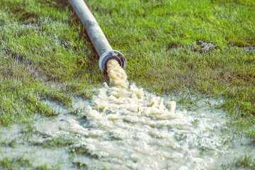 Water pumping rainwater out of the excavation trenches 2