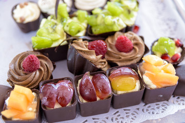 sweet delicious canapés served on a plate