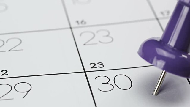 Pin on the date number the thirtieth day of the month is marked with a thumbtack