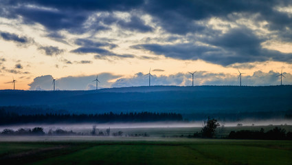 Fototapeta na wymiar Picturesque view of fields in fog