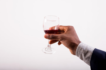 Glass of red wine in the hand