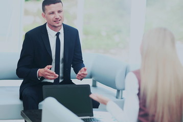 Business people Having Meeting Around Table In Modern Office