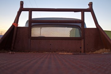 Rustic Old Truck Bed View From Behind Towards Cabin