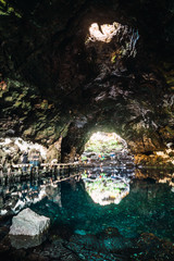 Tourists walking?in cave