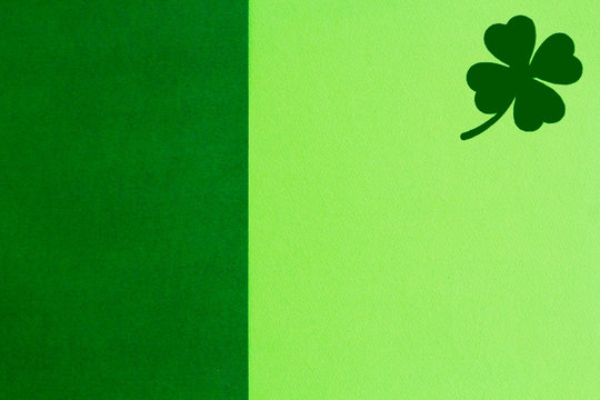 Picture of Saint Patricks Day background with clover over green copy space