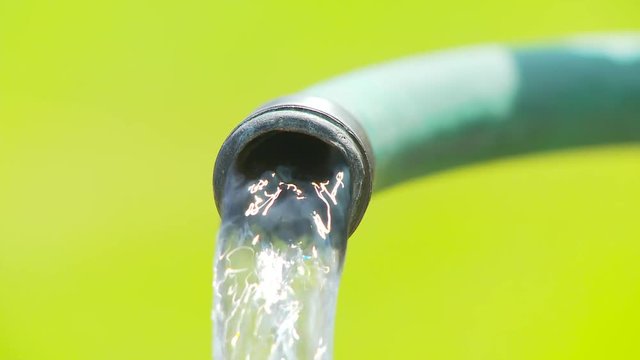 straight shot of garden hose, medium-pressure flow