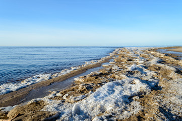 frozen beach in cold winters day