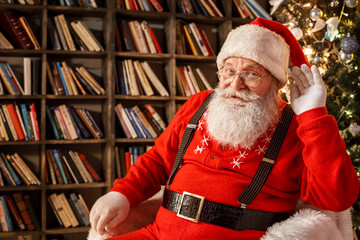 Santa Claus in the library christmas new year concept