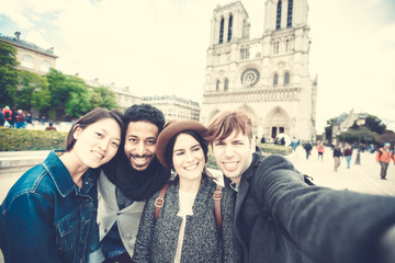 Multi-ethnic Group Of Friends Having Fun In Paris, Notre Dame
