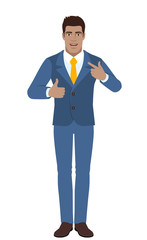 Businessman showing thumb up and  pointing the finger at himself