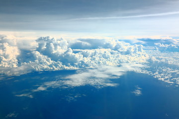 Naklejka na ściany i meble Aerial view beautiful white clouds in blue sky. Nice background.