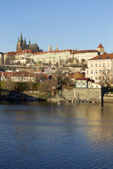 View on the winter Prague gothic Castle above River Vltava in the sunny Day, Czech Republic