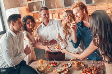 Group of friends party together indoors celebration