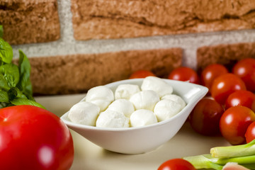 bruschetta with tomatoes, mozzarella, Parma ham and basil