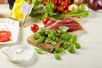 bruschetta with tomatoes, mozzarella, Parma ham and basil
