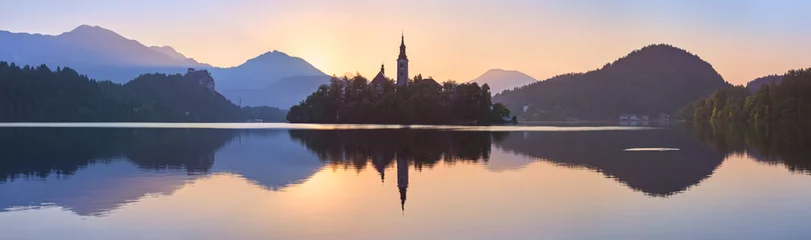 Deurstickers Church and Castle in lake Bled, Slovenia at sunset, scenic summer panorama © Valeriy
