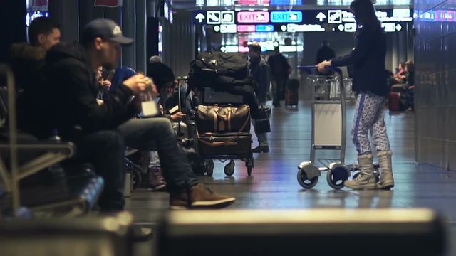 People waiting their flights in airport