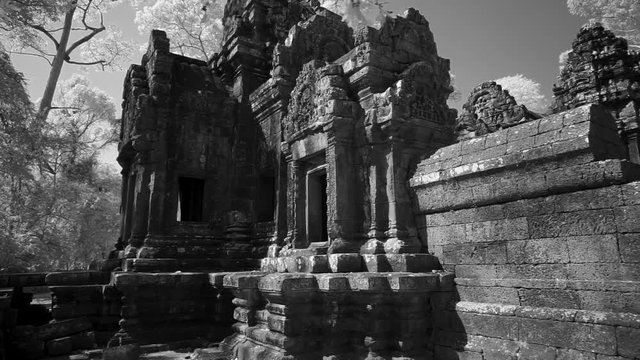 Very slow steadicam gimbal moving around the Wat Thommanon in the Angkor Wat architectural world heritage site.