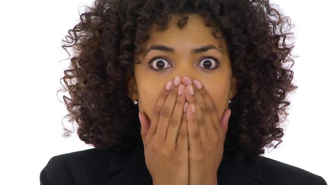 Businesswoman acting shocked and worried