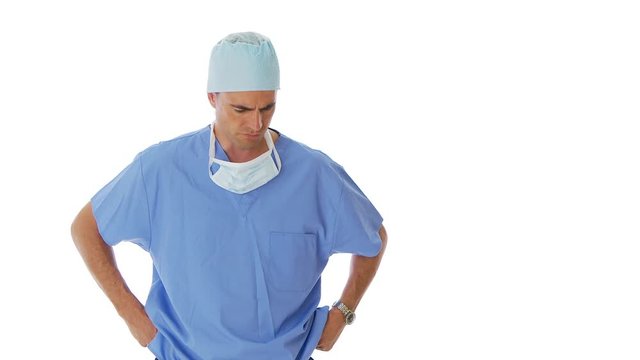 Unhappy surgeon delivering bad news