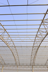 Fototapeta premium Steel structure workshop roof is under construction