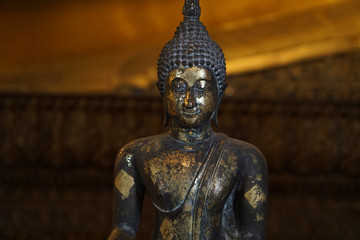 golden buddha statue close-up