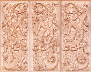 Wood carving Buddhist temple door public