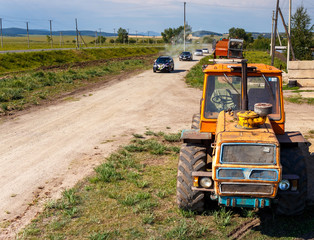 Matchmakers going.A village street. A rural wedding. The wedding procession.
