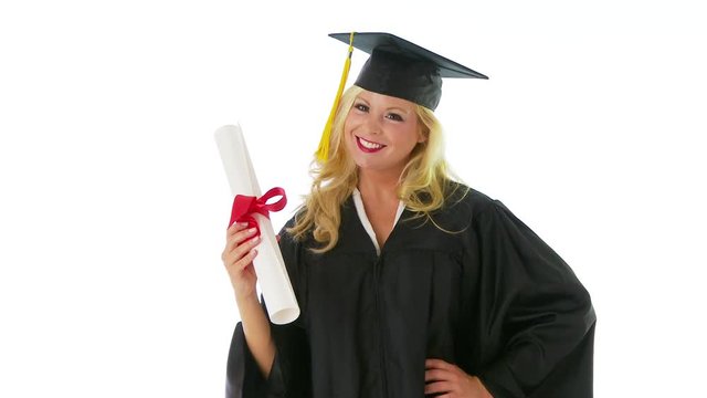Young woman in graduation gown holding diploma