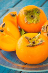 Wet ripe persimmons or date-plum fruits