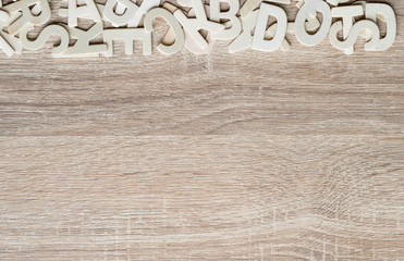 Top view ABC alphabet on wood background