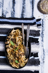 Fried oyster mushrooms with onions