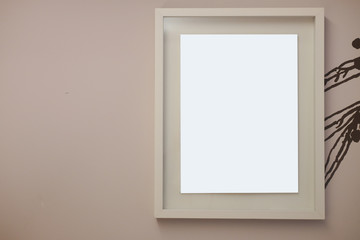One blank frame on wall.