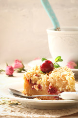 Cherry pie strasheim and walnuts on white plate